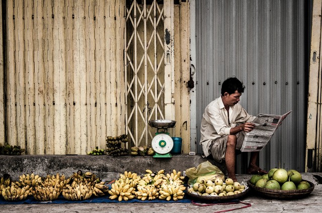 Photo by Thach Tran from Pexels: https://www.pexels.com/photo/man-sitting-near-fruits-723991/