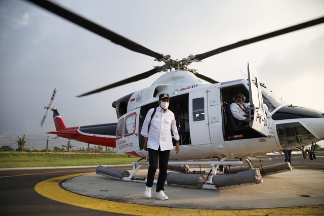 Helikopter yang ditumpang Menteri Perhubungan Budi Karya Sumadi memantau jalur mudik.  Foto: Aditia Noviansyah/kumparan