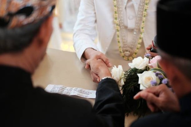 Ijab kabul adalah proses sakral dalam akad nikah. Foto: Unsplash.com