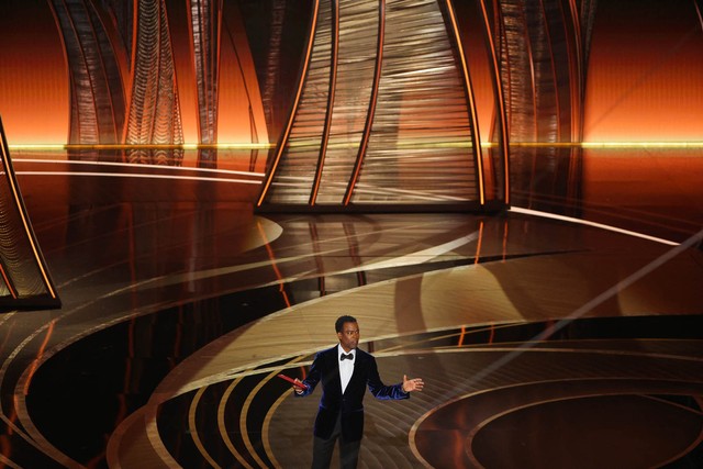 Chris Rock berbicara di Oscars ke-94 Foto: Brian Snyder/REUTERS