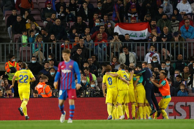 Selebrasi pemain Cadiz usai mencetak gol ke gawang FC Barcelona pada pertandingan lanjutan Liga Spanyol di Camp Nou, Barcelona, Spanyol. Foto: Albert Gea/REUTERS