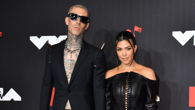 Kourtney Kardashian dan Travis Barker. Foto: ANGELA WEISS/AFP