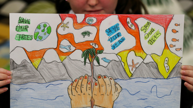 Anak Sekolah Dasar di Glasgow Belajar Tentang Perubahan Iklim Jelang KTT Foto: REUTERS/Russell Cheyne