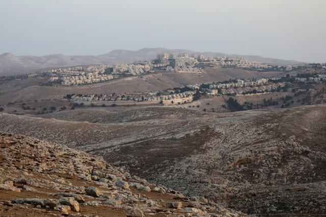 Pemandangan pemukiman Israel Har Homa di Tepi Barat yang diduduki Israel. Foto: Ammar Awad/REUTERS