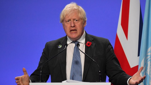 Perdana Menteri Inggris Boris Johnson berbicara di Konferensi Perubahan Iklim PBB COP26 di Glasgow, Inggris. Foto: ANDY BUCHANAN/AFP