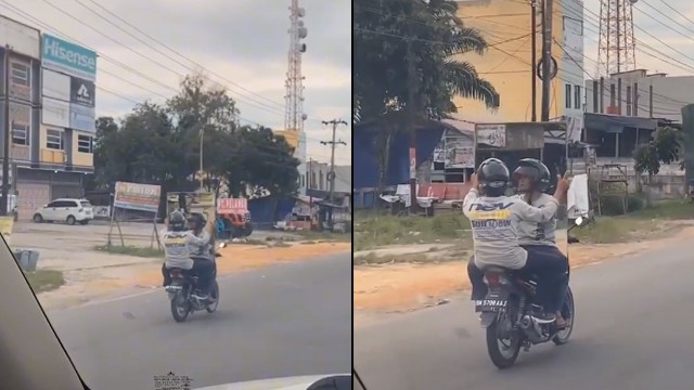 Pria naik motor membawa cermin. (Foto: @fiskal_99/TikTok)