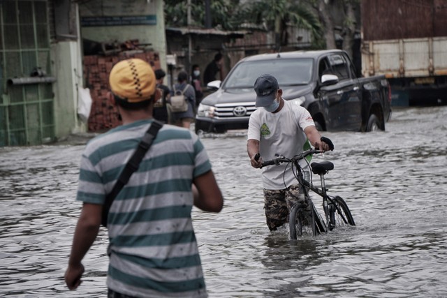 Ilustrasii banjir di Jakarta. Foto: Jamal Ramadhan/kumparan