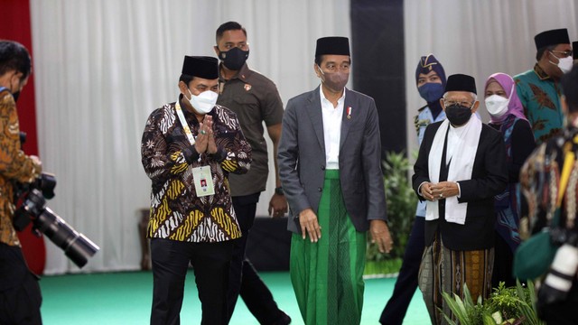 Presiden Jokowi dan Wapres Maruf Amin di acara Muktamar NU. Foto: Tim Media Muktamar NU