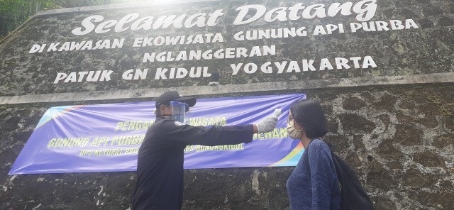 Penerapan protokol kesehatan di kawasan wisata Nglanggeran, Gunungkidul. Foto: Erfanto/Tugu Jogja