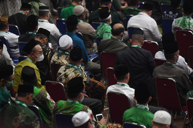 Suasana sidang pleno pada Muktamar Nahdlatul Ulama (NU) ke-34 di Universitas Lampung. Foto: ANTARA FOTO/Hafidz Mubarak A