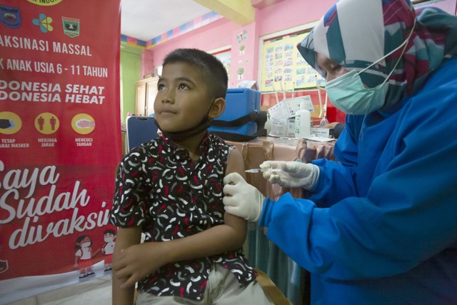 Vaksinasi kelompok usia 6 hingga 11 tahun di Kota Sawahlunto, Sumatera Barat. Foto: dok BINDA