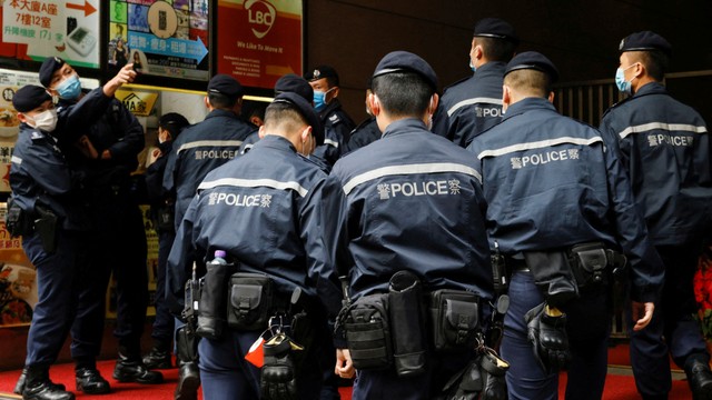 Polisi China. Foto: Tyrone Siu/REUTERS
