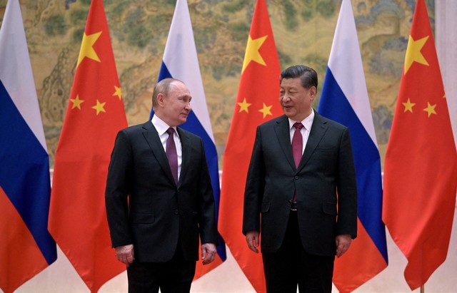 Pertemuan Vladimir Putin dengan Xi Jinping di Beijing. Foto:  Sputnik/Aleksey Druzhinin/Kremlin via REUTERS 