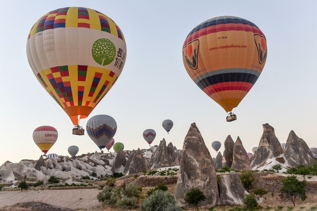 Balon udara di wilayah bersejarah Cappadocia Turki, Anatolia Tengah, Turki timur, pada 5 September 2017 Foto: Yasin AKGUL /AFP