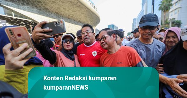 Foto: Saat Pramono Anung Pakai Baju Oranye Sapa Warga di CFD Jakarta