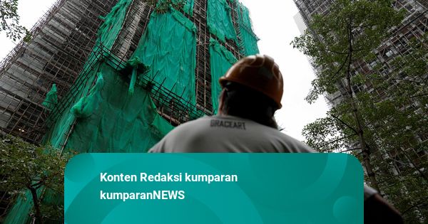 Foto: Diduga Picu Kebakaran, Jaring Perancah di Bangunan Hong Kong Dicabut