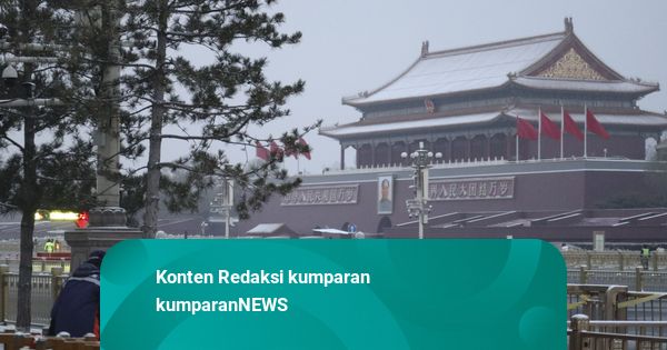 Foto: Salju Mulai Menyelimuti Beijing, China