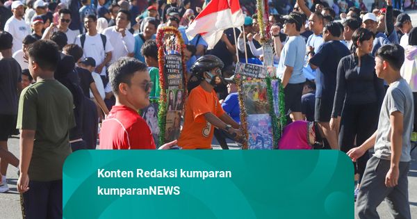 Foto: Antusiasme Warga Berolahraga di CFD Bundaran HI