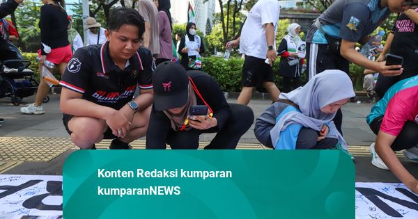 Foto: Warga di CFD Jakarta Gelar Aksi Support Iran dan Palestina