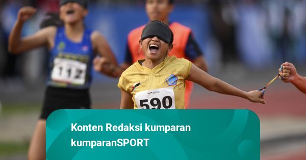 Foto: Aksi Pelari Tunanetra Raih Emas di Peparnas XVII Solo 2024