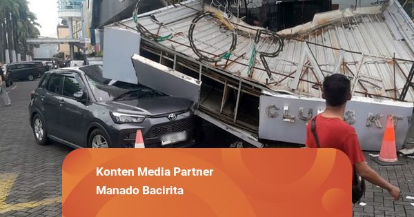 Mobil Pribadi Anggota Polri di Manado Rusak Tertimpa Papan Nama Eks Klub Malam
